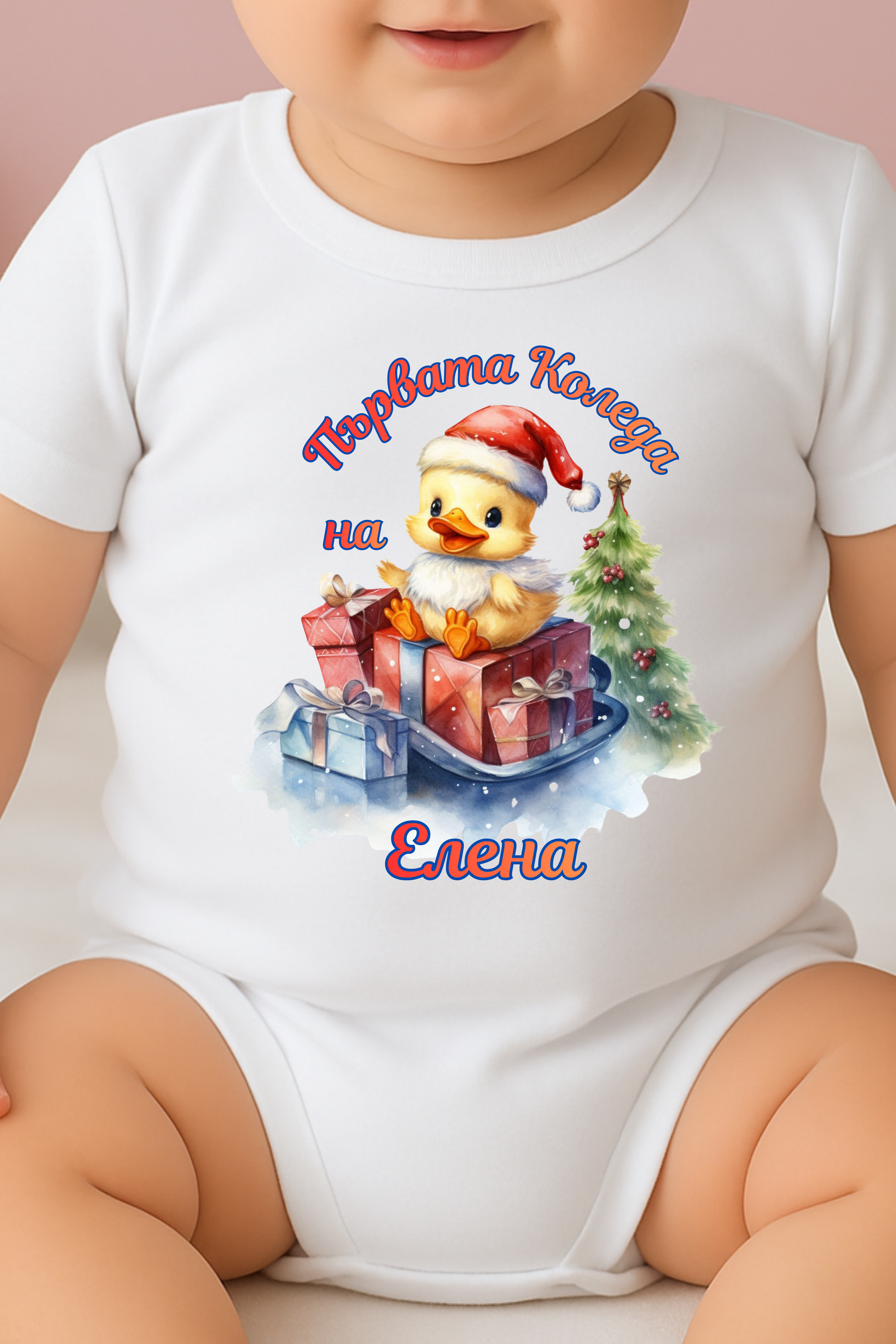 Baby wearing a white onesie with a Christmas-themed design and text.
