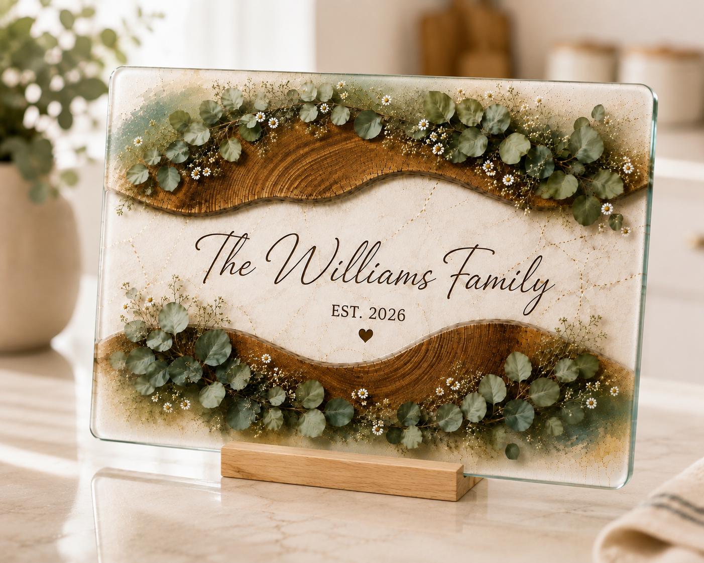 Personalized housewarming gift cutting board with family name and elegant boho farmhouse floral design.