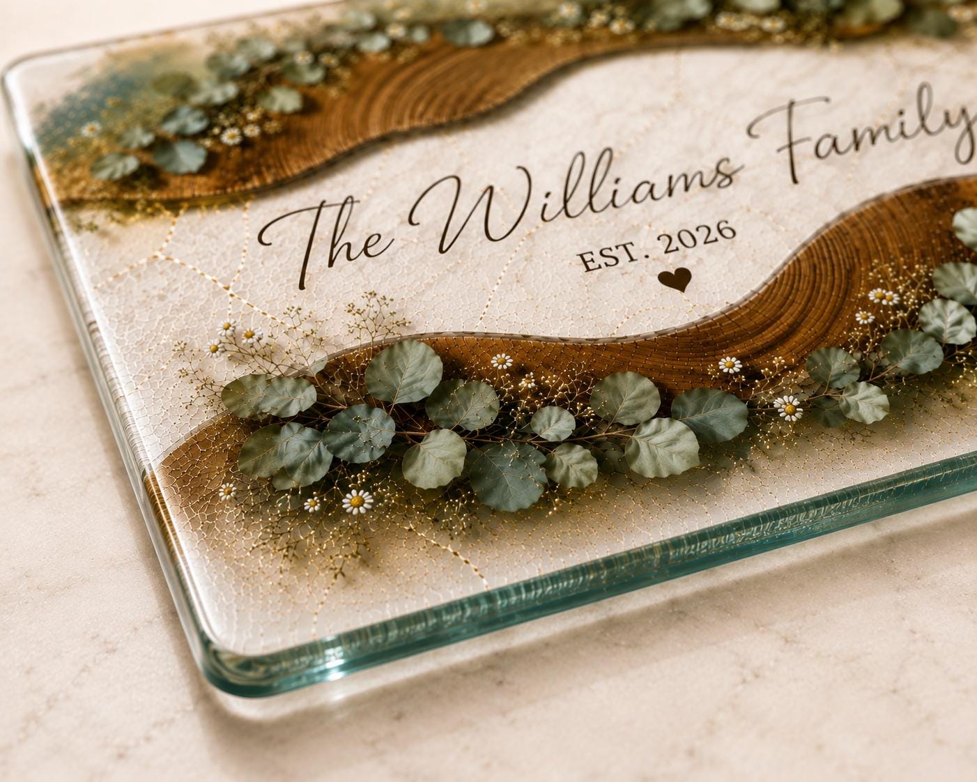 Close-up of personalized family kitchen board with script lettering, EST year, and small heart detail.