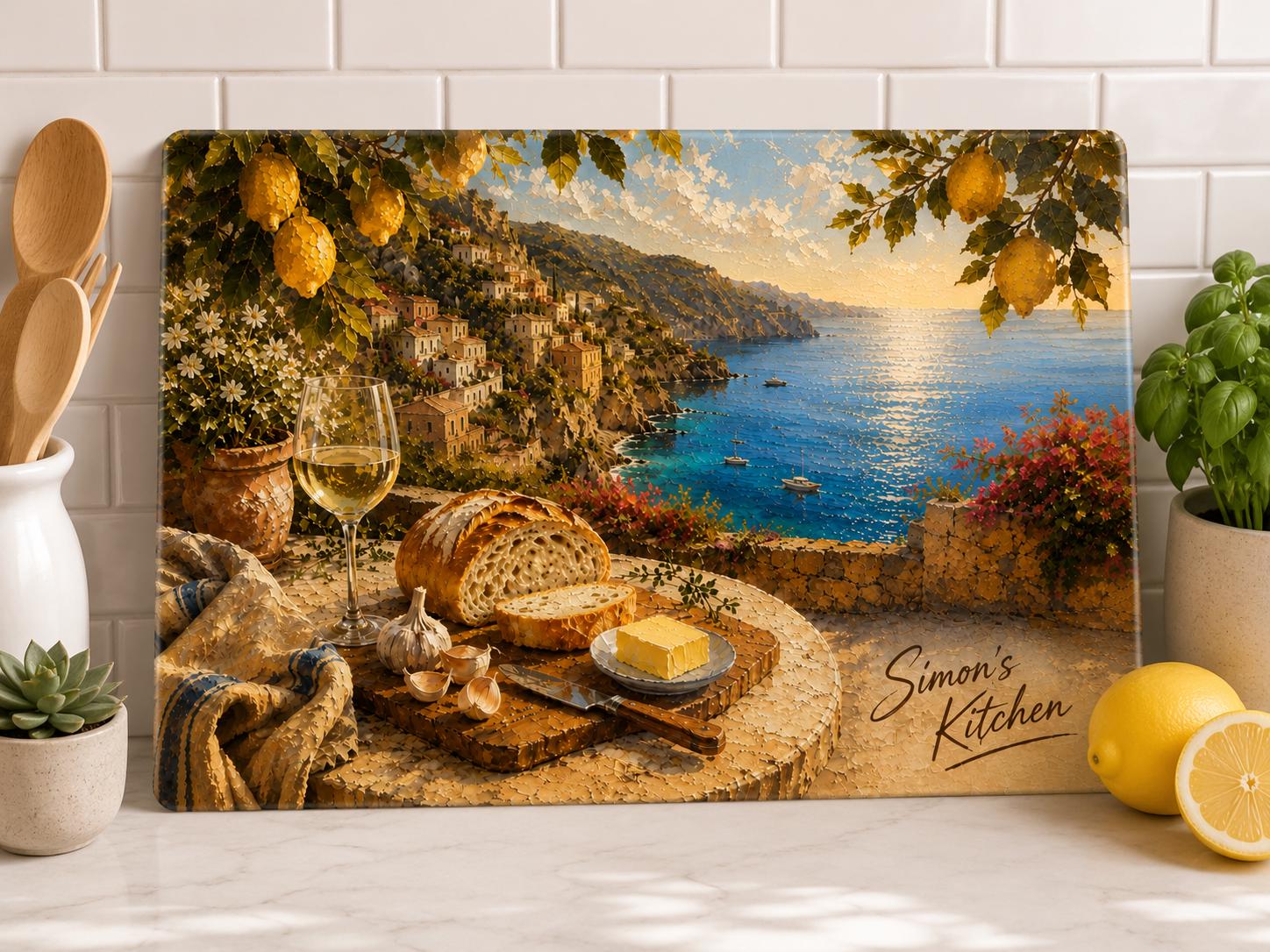 Amalfi Coast cutting board leaning against white tile backsplash in modern kitchen with fresh herbs and lemons
